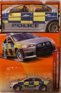 MATCHBOX #57 Mitsubishi Lancer Evo British Police   SILVER (NEW in 