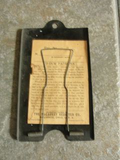   Register Co, sales slip holder, metal with spring action, old, black