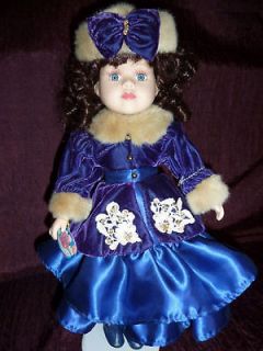 Collectible Doll Brass key porcelain 16 doll in Winter clothing Very 
