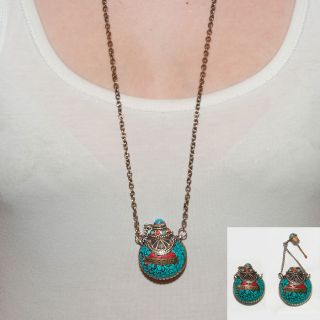   Snuff bottle from Tibet.In Necklace form with Turquoise and Red Coral