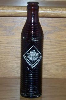 1950s USA ORANGE CRUSH 6 oz TALL SLIM RIBBED AMBER SODA BOTTLE 
