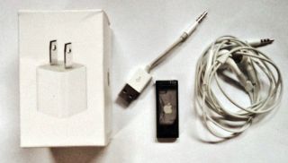 Apple iPod shuffle 3rd Generation Black (4 GB)   with extra