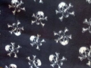Black with white skull pirate fleece fabric by the yard
