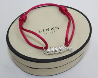   OF LONDON Fuchsia Pink Cord Silver Sweetie Friendship Charm Bracelet