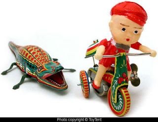 Crocodile chasing boy on tricyle  mechanical tin toys boxed set
