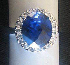 14K Half Carat Oval Tanzanite and Diamond Princess Diana Style Ring 