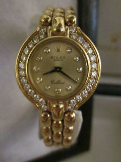 Beautiful Cellini Rolex 18 K gold ladies diamond bezel watch Reduced 
