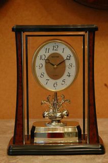 Rhythm Clock, Shelf, Rotating Pendulum. 4SG629WR06