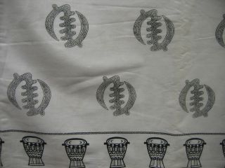 AFRICAN FABRIC   DRUM BORDER WITH BLACK AND WHITE SYMBOLS