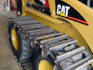 skidsteer over the tire tracks in Parts & Parts Machines