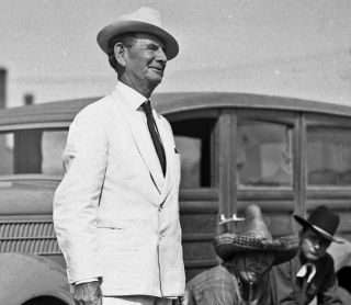Original 1930s glass negative Tom Mix Circus. Man in white suit. 36 
