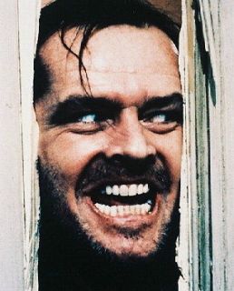 Jack Nicholson famous Heres Johnny scene wicked grin The Shining 