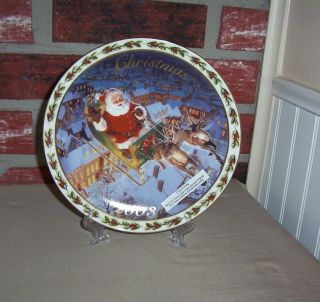 AVON PLATE 2003 HOLIDAY TREASURES  SANTA IN FLIGHT  8 1/2 INCH WITH 