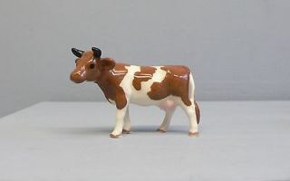 Retired Hagen Renaker Guernsey Cow W/ Black Horns