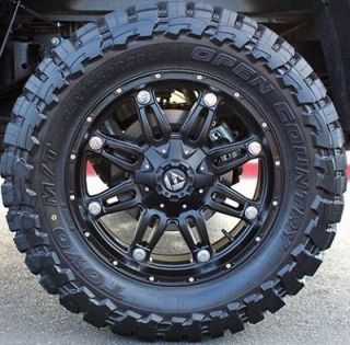   RIMS FUEL OFF ROAD HOSTAGE W/ 33X12.50X20 TOYO OPEN COUNTRY MT TIRES