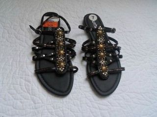 NWOT BLACK GLADIATOR SANDALS WITH GOLD, SILVER AND BRONZE 