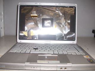 compaq presario v2000 laptop not working for parts from canada