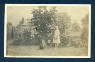 g3428 postcard girl holding pit bull type dog on leach