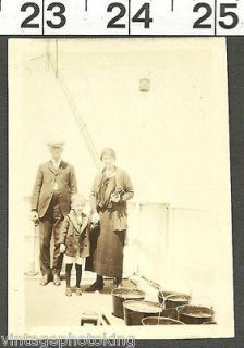 VINTAGE OLD PHOTO 1924 / MOM DAD AND THEIR SON ON A BOAT USING 