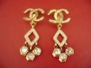 AUTH Chanel vintage CC logos w/ crystal dangle clips earrings