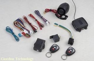 CAR ALARM KEYLESS ENTRY SYSTEM WITH 2 FOUR BUTTON REMOTES! NEW IN THE 