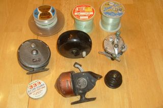 LOT OF 4 FISHING REELS 5 OPENED FISHING LINE 1 LINE CLEANER ECT