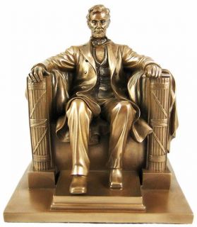   bronze finish statue titled abraham lincoln is a replica of the one