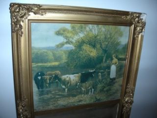 antique beveled mirror print of lady cattle grazing