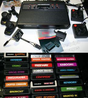Atari 2600 Game system console 25 games joy sticks Game center case 