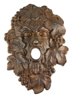 this cast iron wall hanging of bacchus the roman god of
