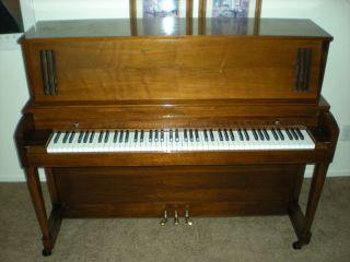 Baldwin studio piano model 243 walnut finish