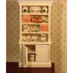 Miniature White Bookshelves filled with Bedroom and Bathroom items 
