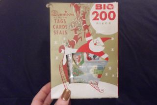 THIS IS A LARGE BOX OF DENNISON VINTAGE ITEMS, CHRISTMAS LABELS, GIFT 