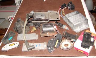 Large Lot of Auto parts Modules Coils Pick ups and more new used all 