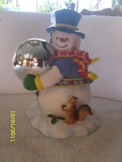 Snowman with silver gazing ball center piece garden piece yard art