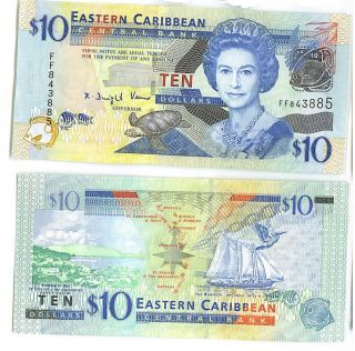 this is a east caribbean states uncirculated banknote pair
