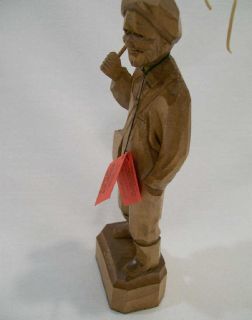 Old stock. Quebec carver signed Caron   Old man with fishing rod..