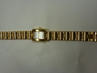 ladies carriage indiglo quartz watch with goldtone bracelet