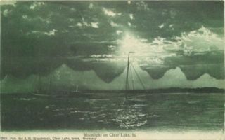 Vintage divided postcard of MOONLIGHT ON CLEAR LAKE, IA. Published