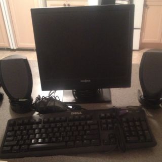 Insignia Computer Monitor, Dell Key Board, Mouse, And Speakers.