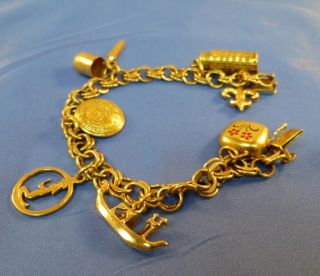  14 K Gold 8 Charm Bracelet Italy 27g