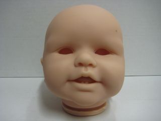 This is a doll HEAD ONLY by Didi Jacobson named Stephanie. She has a