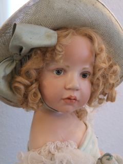 Up for sale is here the beautiful Wax over Porcelain doll Cloe made by
