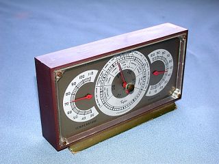  is for a Vintage Taylor Desktop Bakelite & Wood Weather Station
