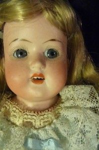 ANTIQUE GERMAN BISQUE CHILD DOLL OUR PET LABEL ON HER KID BODY
