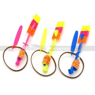 Flying Toy Fun Umbrella Helicopter Rubber Band Rocket Blue LED Light