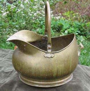 Offered is a fireplace bucket measuring 9“ high to the handle & 17
