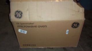 GE Spacemaker Over The Range Microwave White in Color