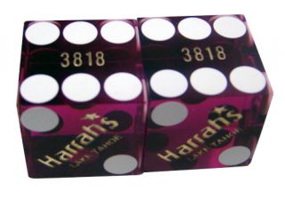 matching harrah s casino dice in a clear plastic tube
