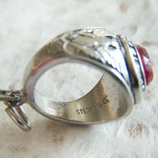 about the charm this classic high school ring charm is detailed just